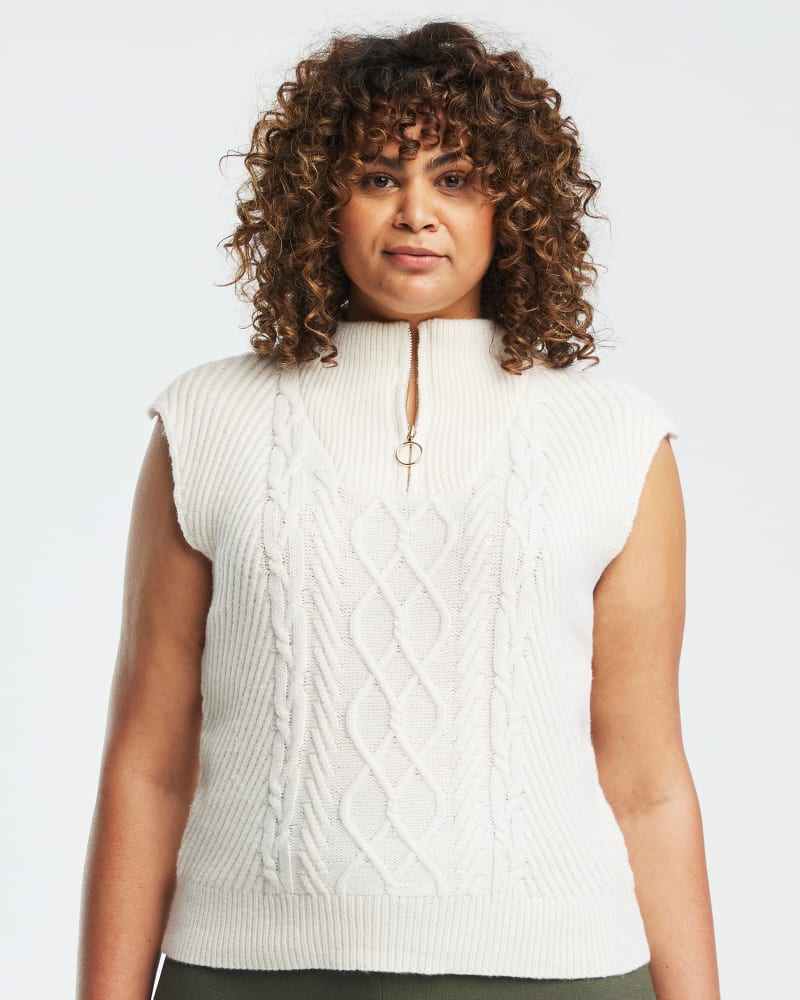 Front of a model wearing a size 18W Kennet Knit Vest in Cream by Estelle. | dia_product_style_image_id:323685